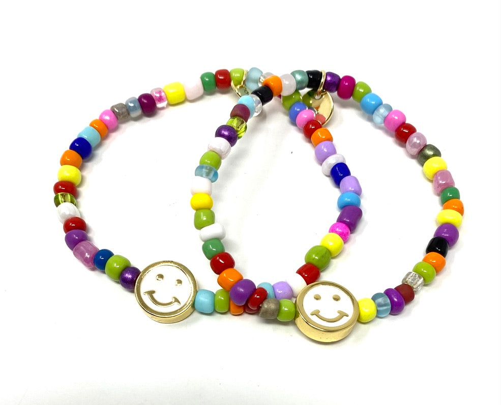 Multi Color Seed Bead Elastic Bracelet With White Enamel Smiley Face