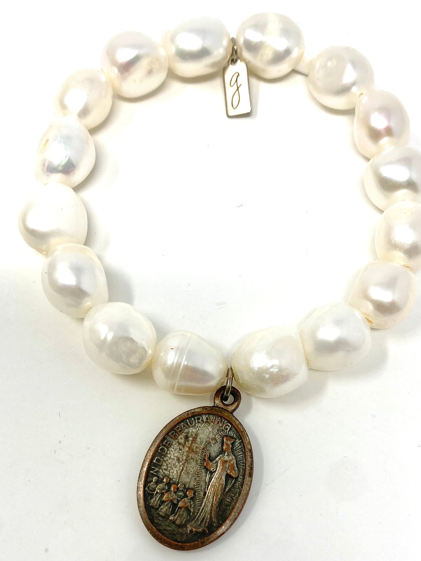 Medium Sized Freshwater Pearl Elastic Bracelet With Vintage Religious Medallion