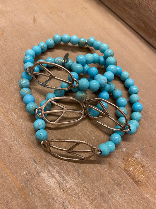 Blue Turquoise Beaded Elastic Bracelet With Silver Peace Sign Connector
