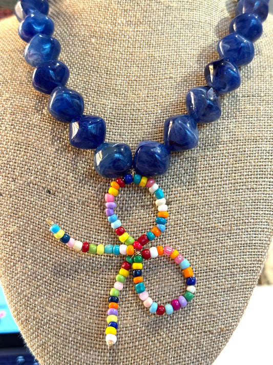 Blue Beaded Necklace With Colorful Bow