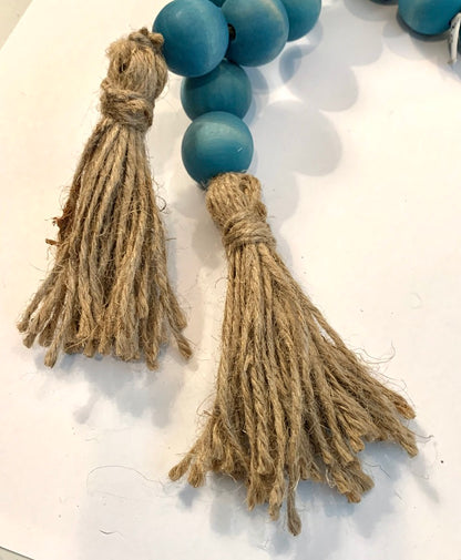 Turquoise Wooden Bottle Beads with Twine Tassels