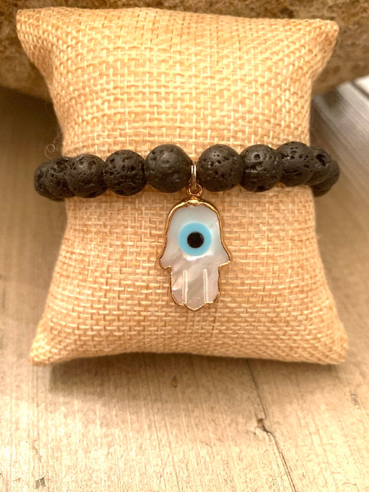 Black Lava Stone Elastic Bracelet with Gold and Mother of Pearl Hamsa Charm