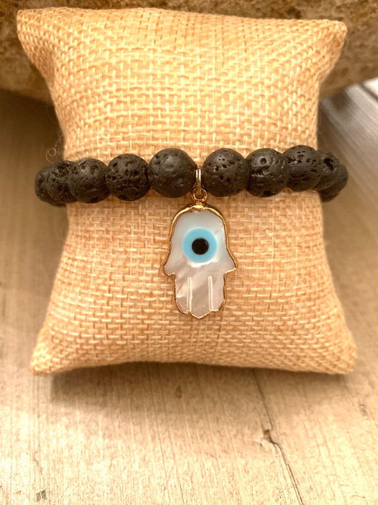 Black Lava Stone Elastic Bracelet with Gold and Mother of Pearl Hamsa Charm