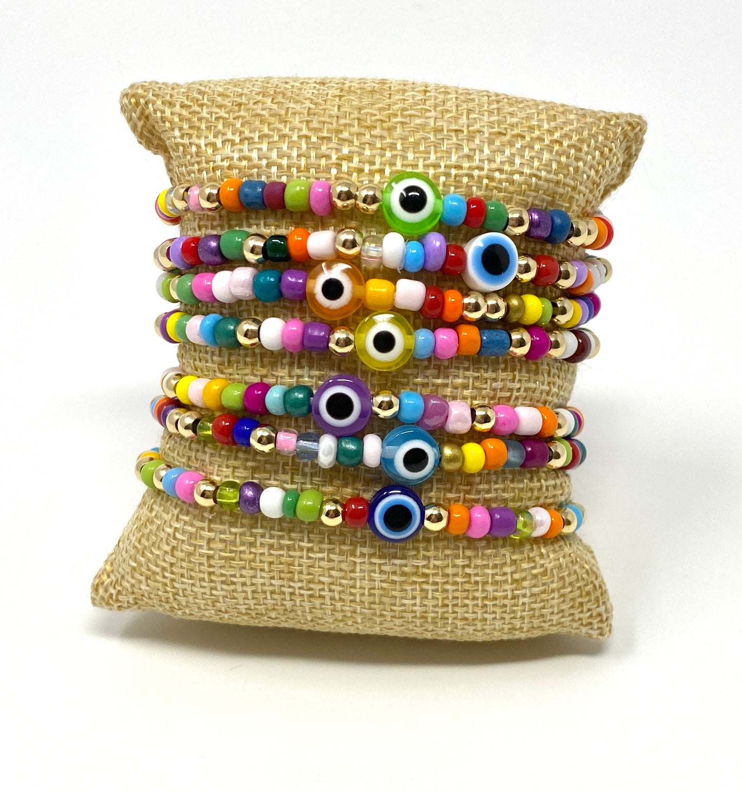Multi Colored Seed Bead Elastic Bracelet With Evil Eye Center Bead