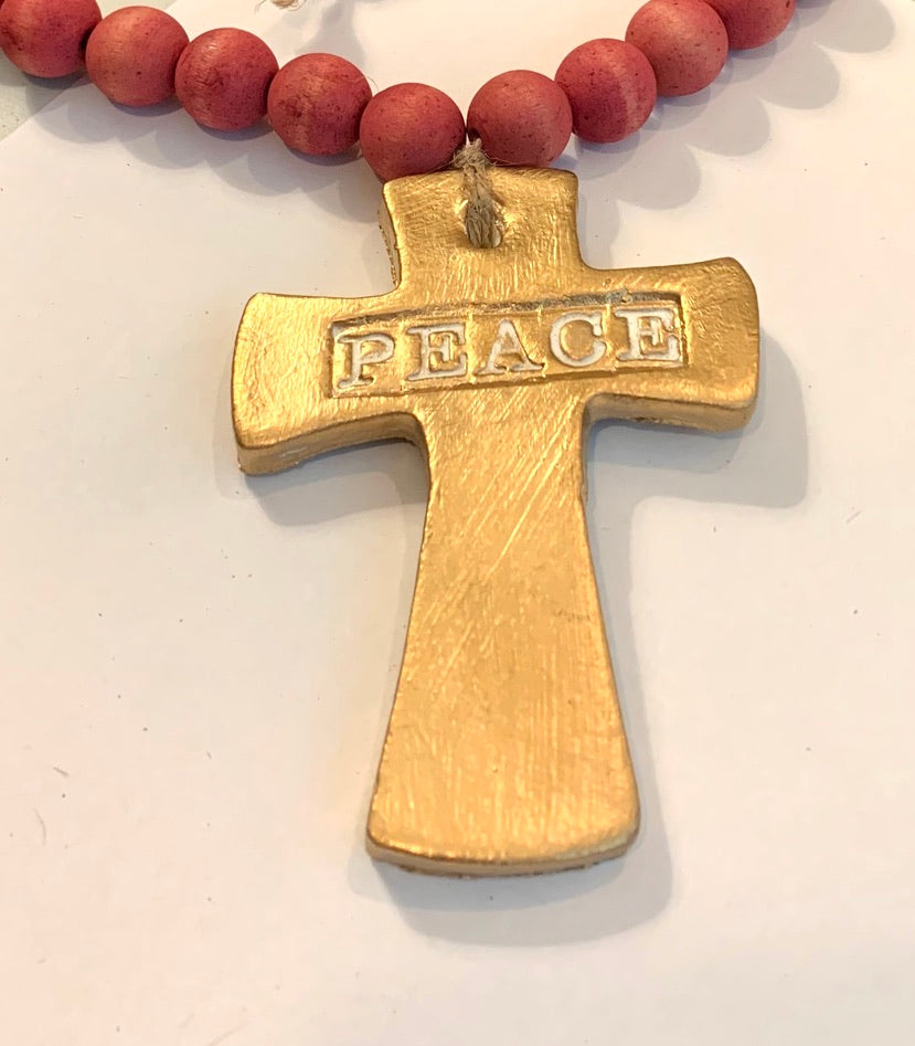 Pink Wooden Bottle Beads with Gold "Peace" Cross