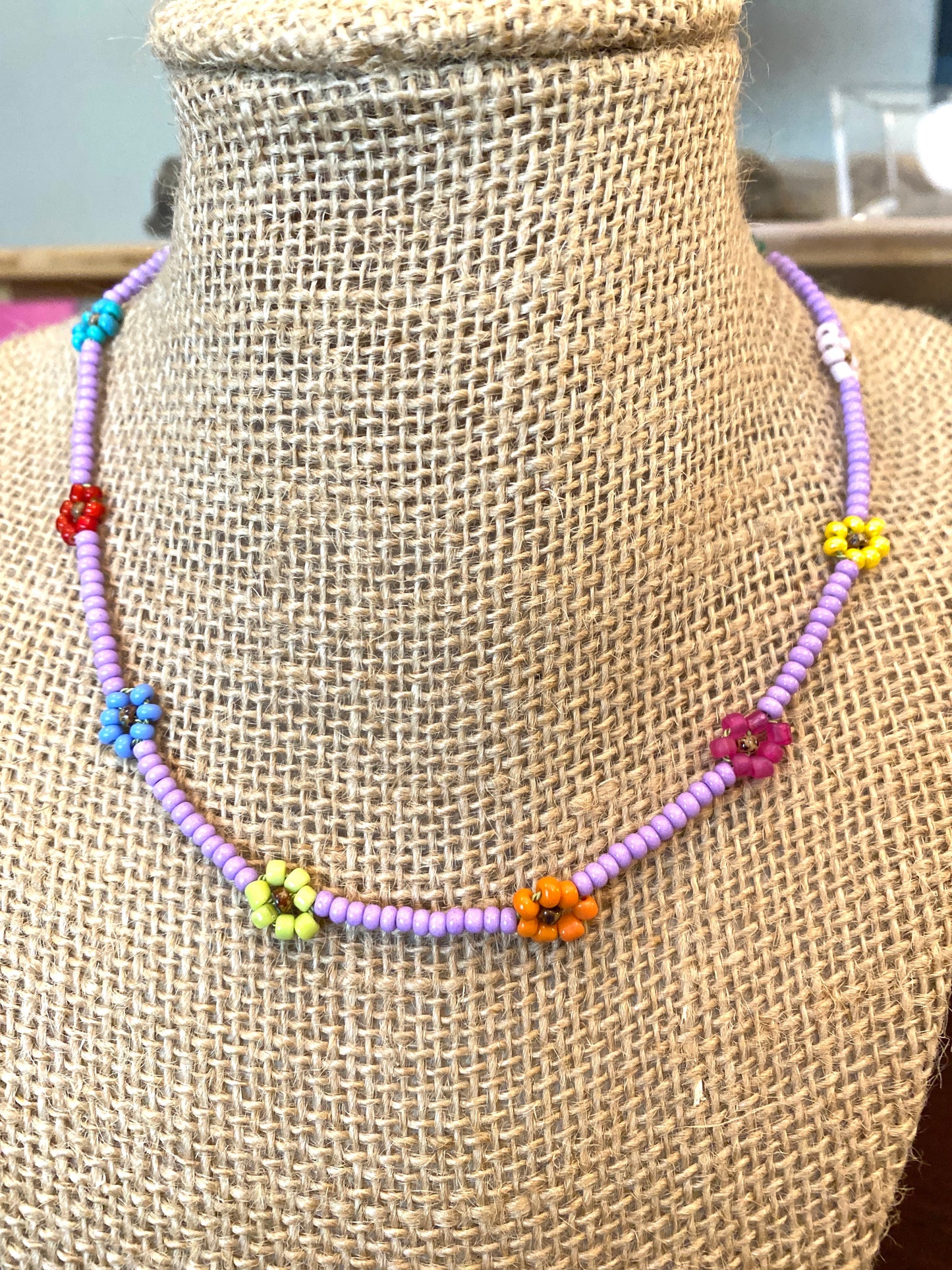 Tiny Lavender Beaded Daisy Chain Necklace With Multi Colored Flowers.