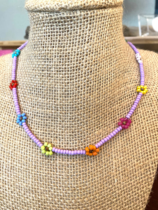 Tiny Lavender Beaded Daisy Chain Necklace With Multi Colored Flowers.