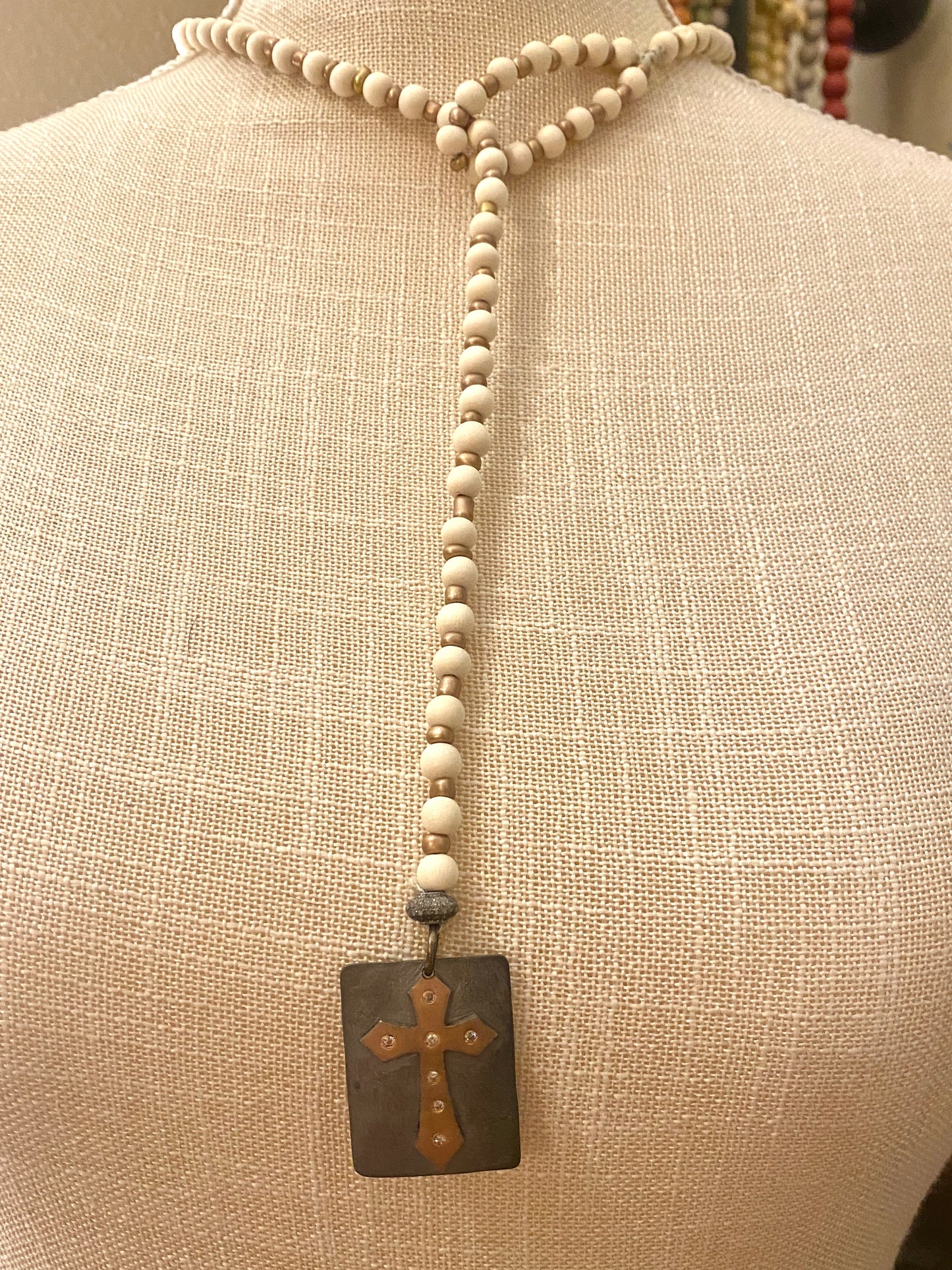 Ivory Wooden Beaded Lariat Necklace with Metallic Seed Beads and Metallic and Diamond Cross Pendant with